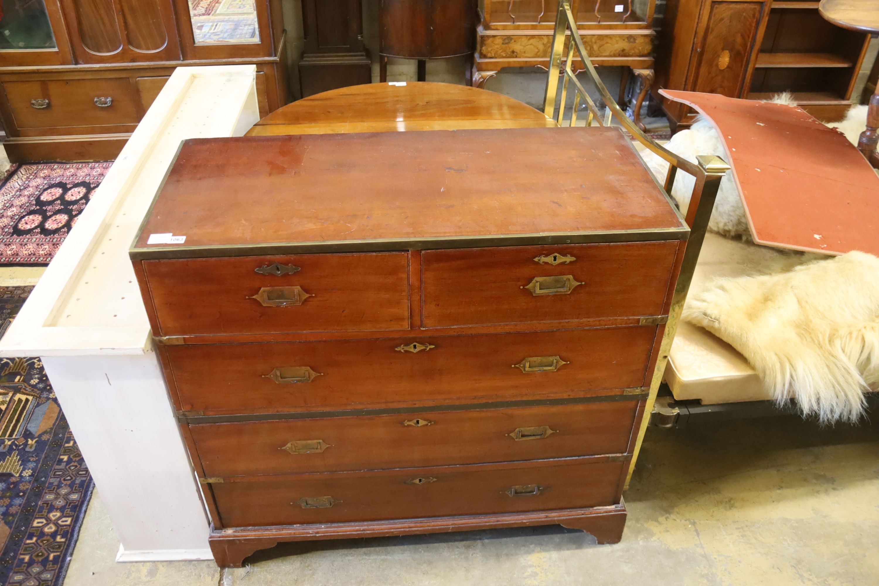 A Victorian brass mounted mahogany campaign chest of drawers, width 106cm, depth 40cm, height 102cm